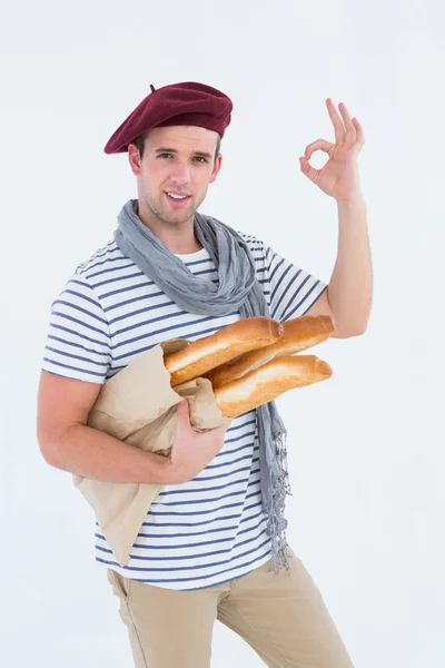 French guy with beret holding baguettes — Stock Photo, Image