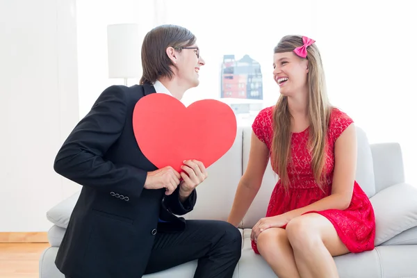 Geeky couple with red heart shape — Stock Photo, Image