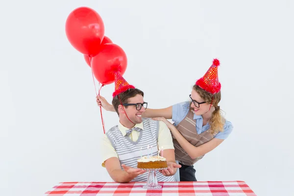 Geeky hipster couple celebrating his birthday — Stock Photo, Image