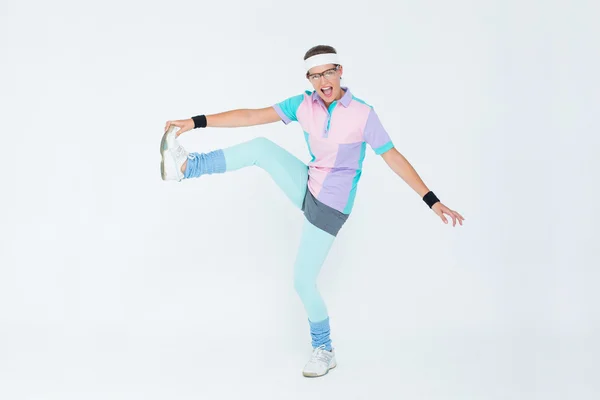 Geeky hipster posing in sportswear — Stock Photo, Image
