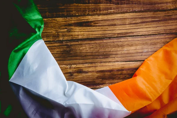 Ireland flag on wooden table — Stock Photo, Image