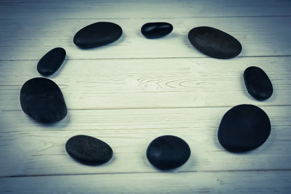 Sten cirkel på ett bord — Stockfoto
