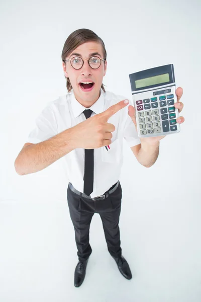 Geeky cheering businessman holding calculator — Stock Photo, Image