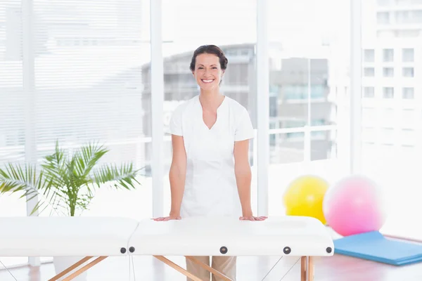 Smiling doctor looking at camera — Stock Photo, Image