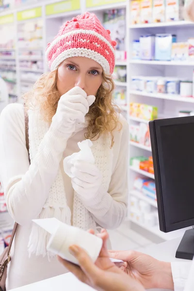 Sick girl with scarf and colorful hat — Stock Photo, Image