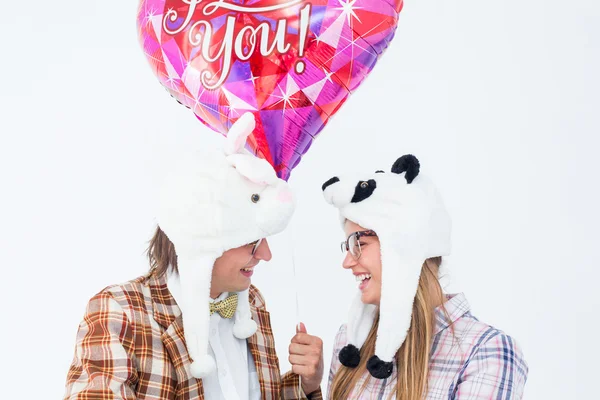 Geeky hipster couple looking at each other — Stock Photo, Image