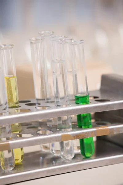 Test tubes with colorful fluid inside — Stock Photo, Image