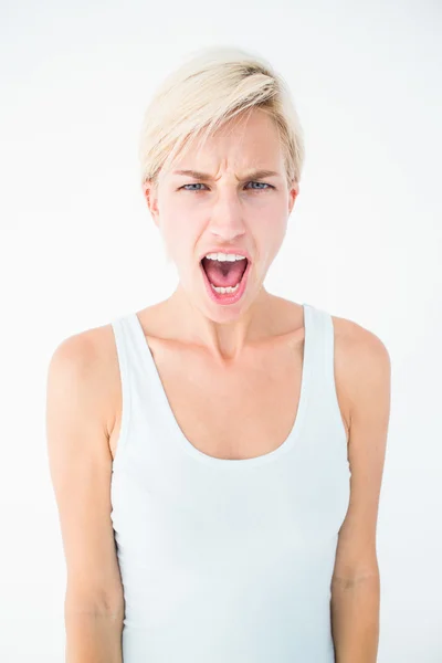 Angry blonde woman screaming — Stock Photo, Image