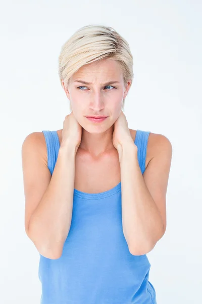 Kobieta cierpi na ból szyi — Zdjęcie stockowe