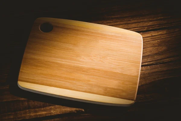 Tavola di legno su un tavolo — Foto Stock