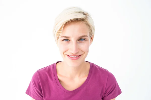 Pretty blonde woman smiling at camera — Stock Photo, Image