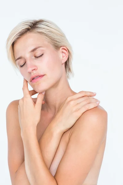 Peaceful woman touching her neck — Stock Photo, Image