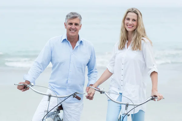 Happy couple cycling together — Stock Photo, Image