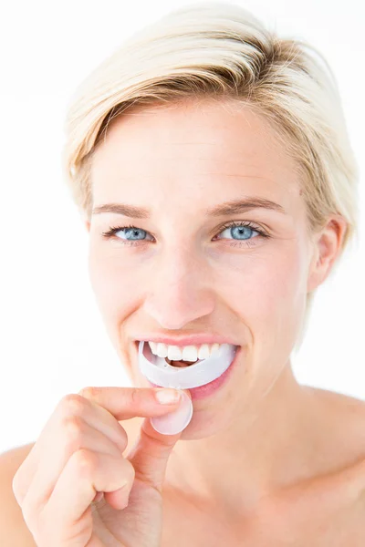 Happy woman putting her gum shield — Stock Photo, Image