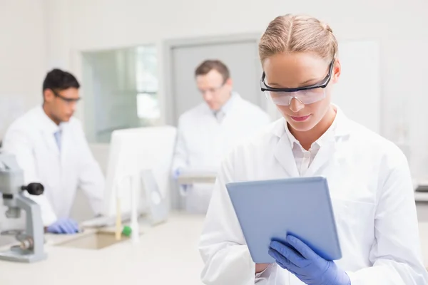 Scientist using tablet — Stock Photo, Image
