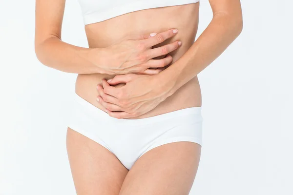 Mujer con dolor de estómago — Foto de Stock