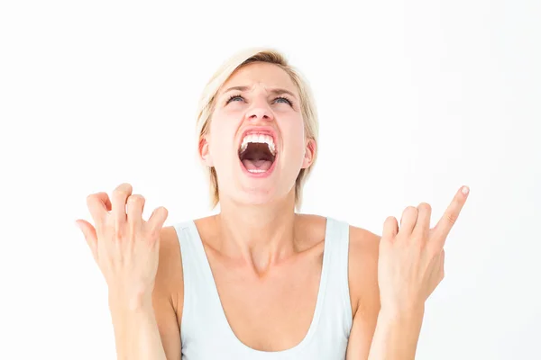 Upset woman screaming with hands up — Stock Photo, Image