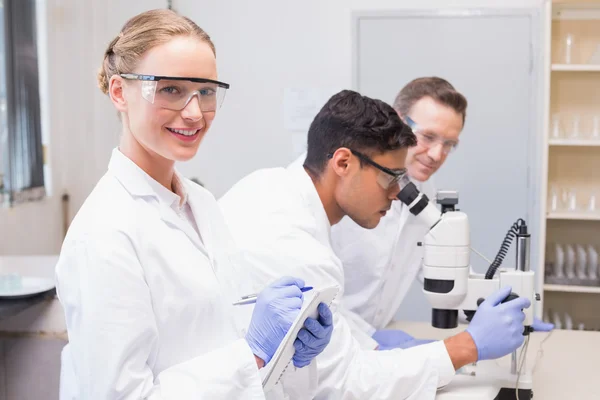 Smiling scientist looking at camera — Stock Photo, Image