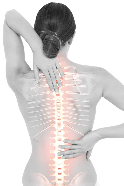背中の痛みと女性の強調表示された背骨 — ストック写真