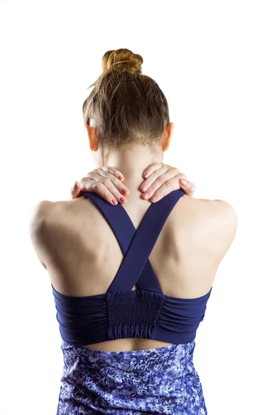 Fit brunette woman with neck injury — Stock Photo, Image