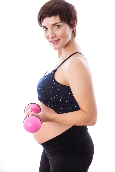 Pregnant woman keeping in shape — Stock Photo, Image