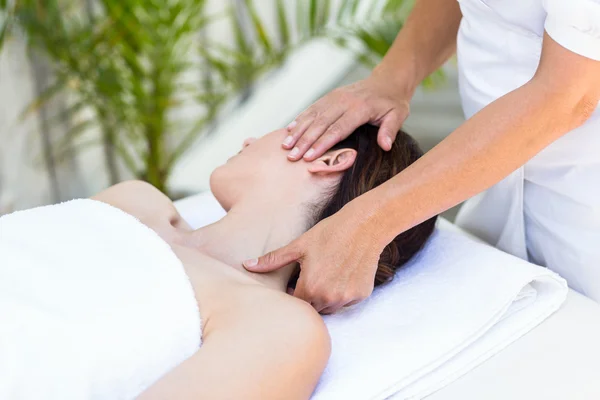Brunette receiving neck massage — Stock Photo, Image