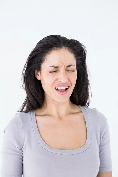 Брюнетка страдает от мигрени — стоковое фото