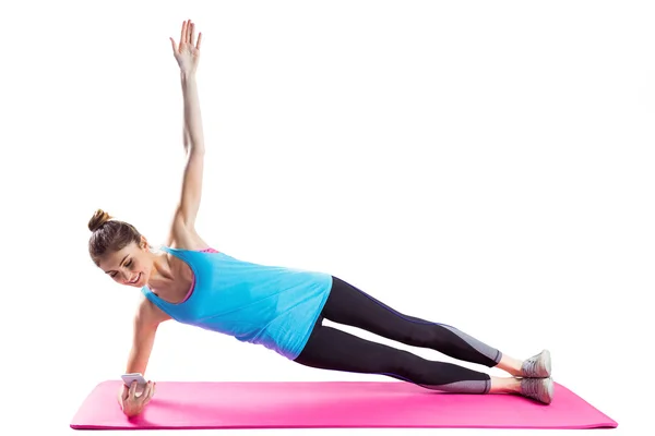 Fit woman doing side plank — Stock Photo, Image