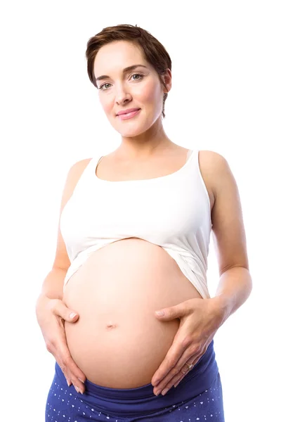 Zwangere vrouw met haar bump — Stockfoto