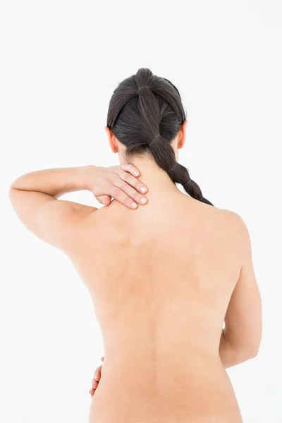 Brunette touching her painful neck — Stock Photo, Image