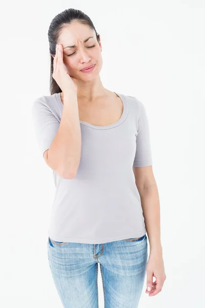Brunette woman suffering from migraine — Stock Photo, Image