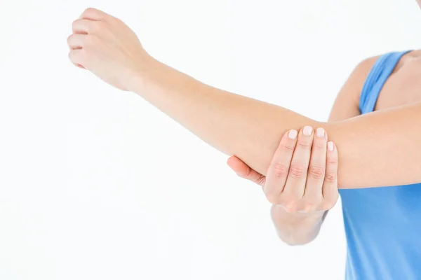 Woman touching her painful elbow — Stock Photo, Image