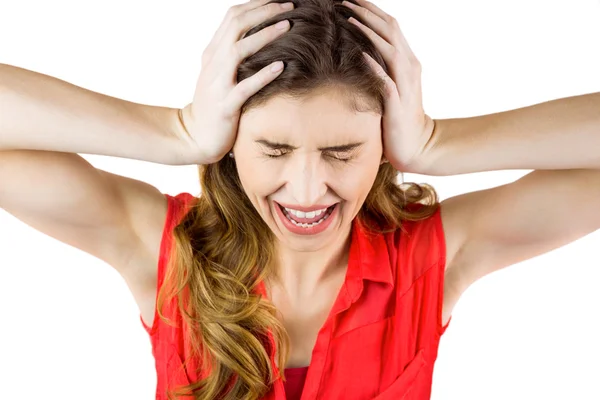 Brunette woman shouting with hands on head — Stock Photo, Image