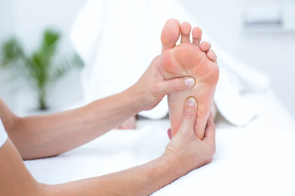 Physiotherapist doing foot massage — Stock Photo, Image