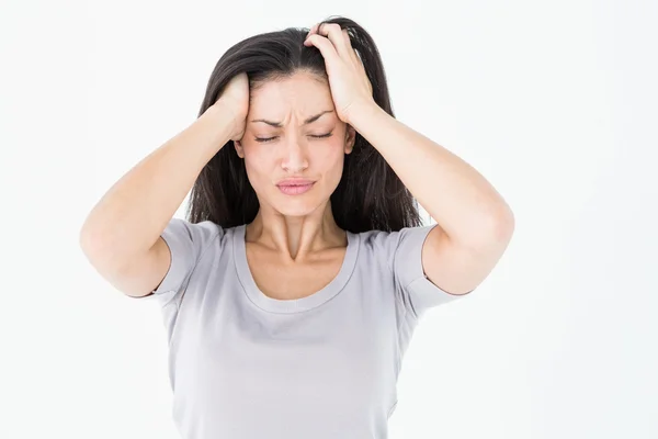 Brunette woman suffering from migraine — Stock Photo, Image