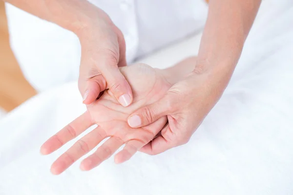 Physiotherapist doing hand massage — Stock Photo, Image