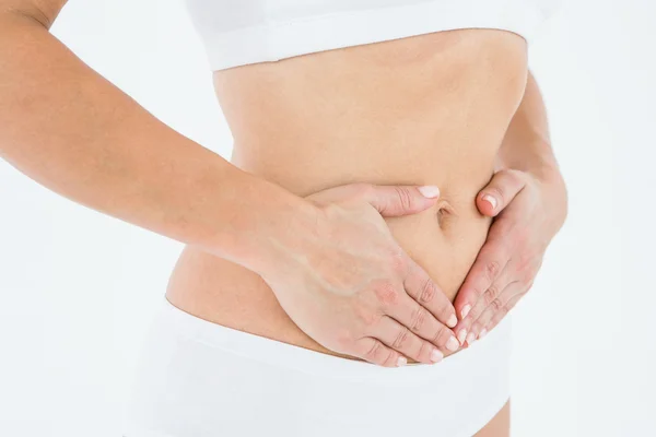 Mujer en forma con dolor de estómago —  Fotos de Stock