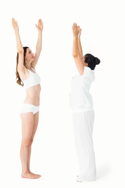 Relaxed women doing yoga — Stock Photo, Image