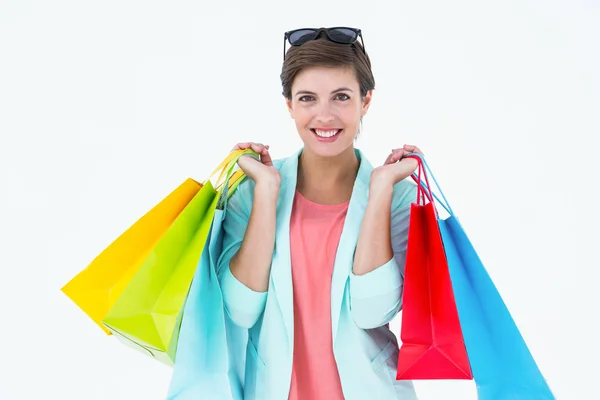 Mujer sosteniendo algunas bolsas de compras —  Fotos de Stock