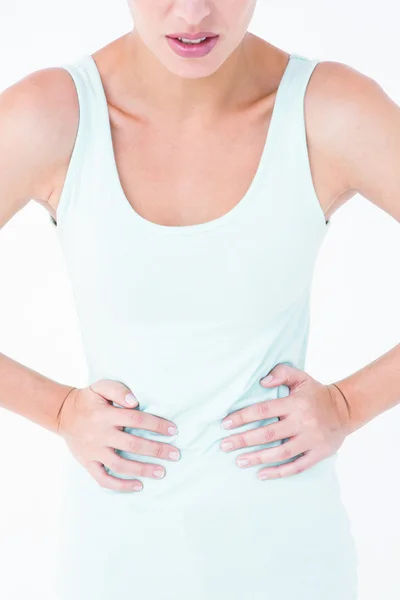 Mujer sufriendo de dolor de estómago — Foto de Stock