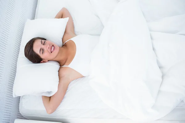 Peaceful brunette sleeping — Stock Photo, Image