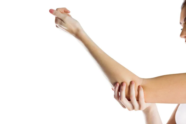 Vältränad kvinna med armbåge skada — Stockfoto
