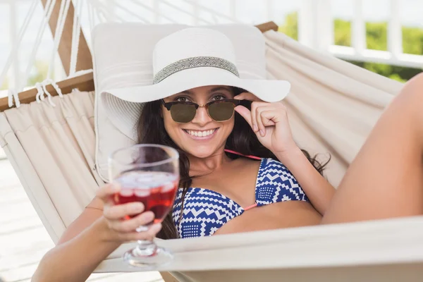 Pretty brunette drinking cocktail — Stock Photo, Image