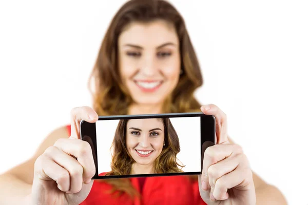 Pretty brunette woman taking a selfie — Stock Photo, Image