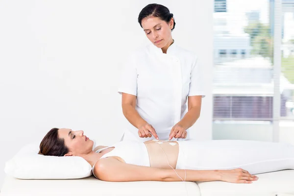 Woman having electrotherapy — Stock Photo, Image