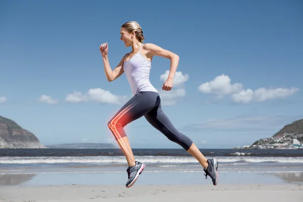 突出显示的下肢骨骼的慢跑的女人 — 图库照片