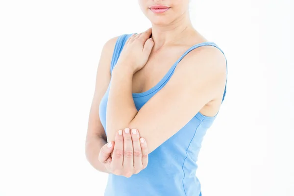 Woman touching her painful elbow — Stock Photo, Image