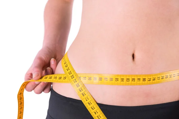 Slim woman measuring waist — Stock Photo, Image