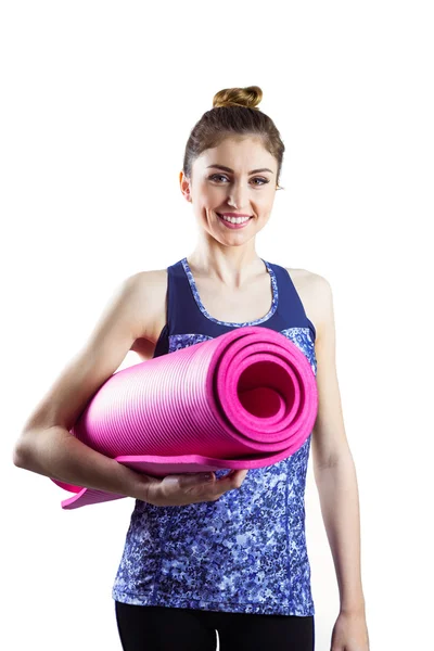 Donna in forma con tappetino yoga — Foto Stock