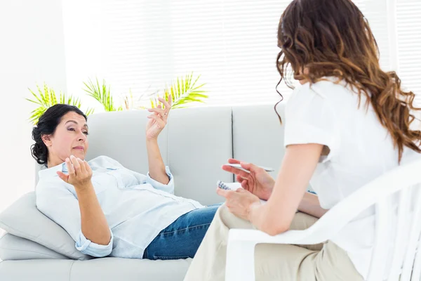 Depressed woman talking to her therapist — Stock Photo, Image